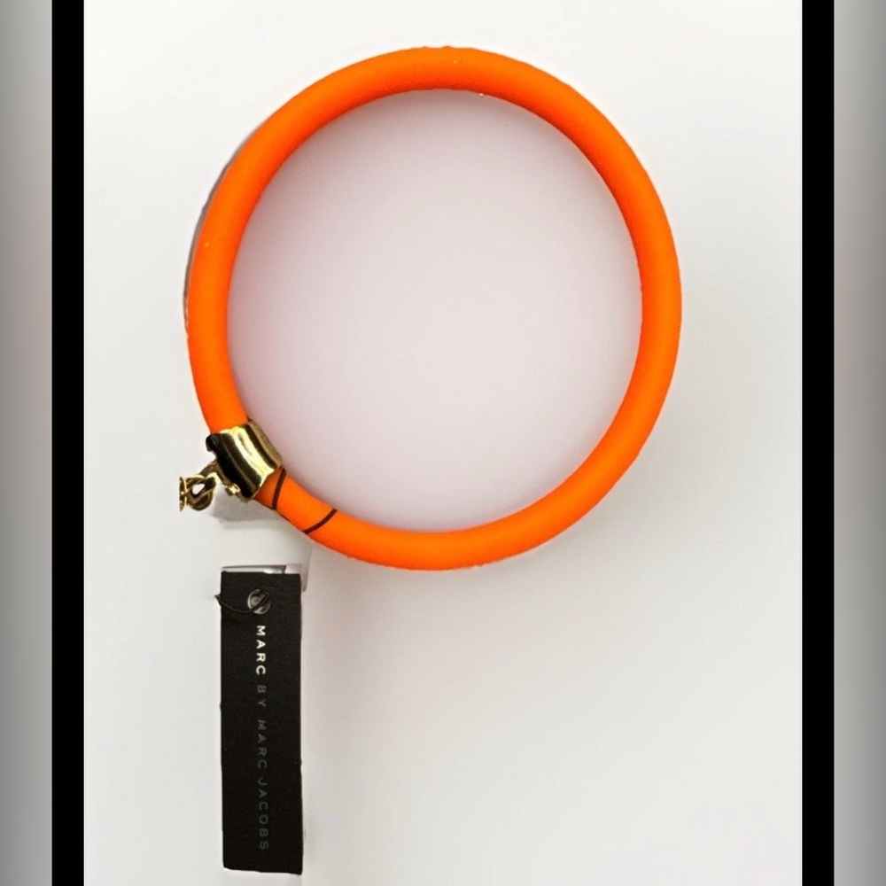 Marc By Marc Jacobs Vibrant Orange Silicone Bracelet with Gold tone charm NWT
